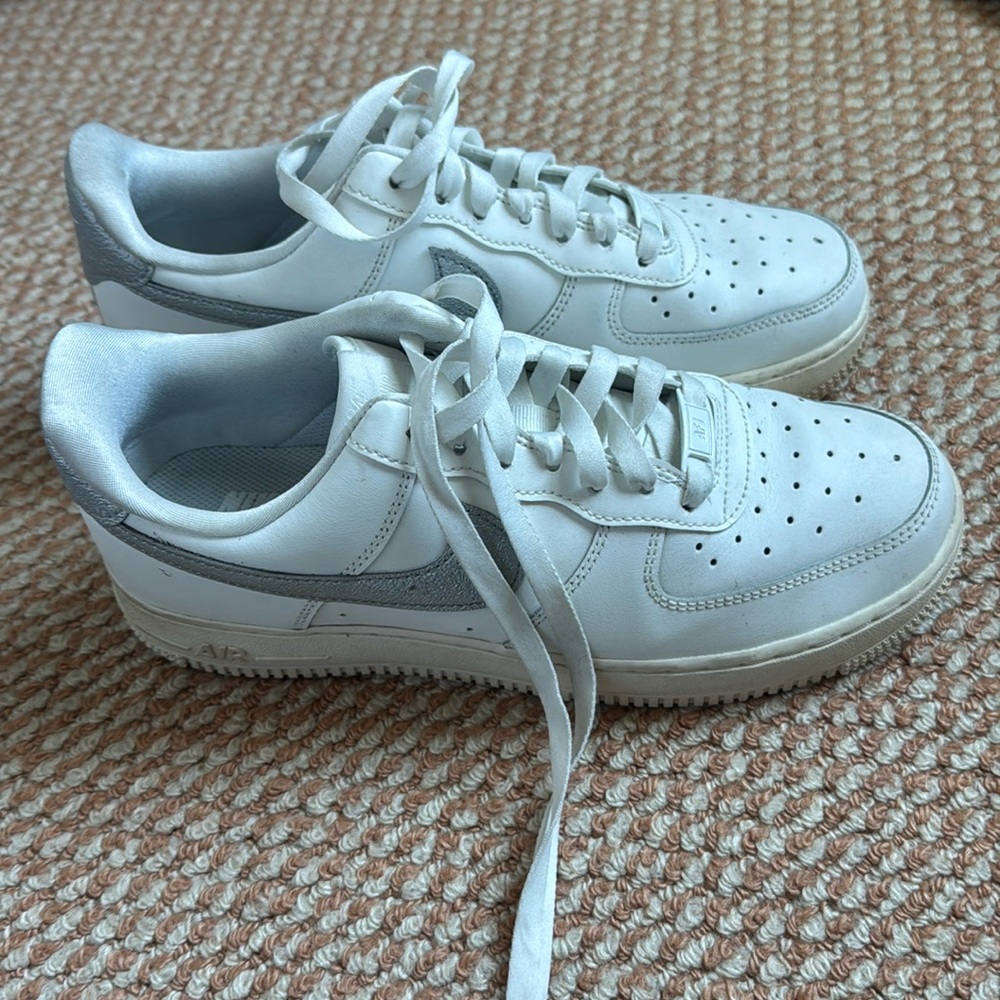 White and silver women’s Nike Air